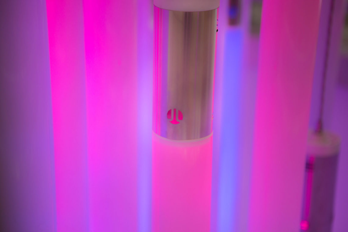 The Jen Lewin Studio emblem on the Flux Chandelier by light artist Jen Lewin